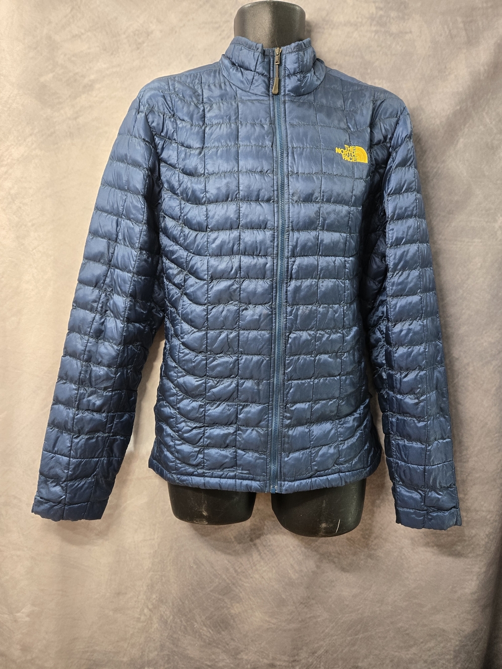 The North Face Blue Quilted Lightweight Insulated Jacket with Yellow Logo